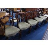 A set of five Victorian mahogany dining chairs