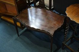 Mahogany tray top table with four pull out sides