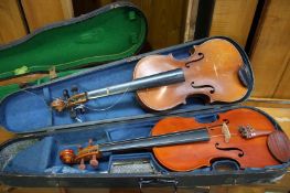 Two violins in cases