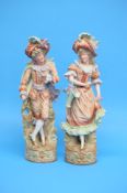 A pair of continental bisque figures of a gallant