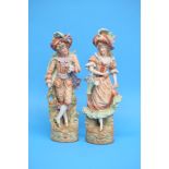 A pair of continental bisque figures of a gallant