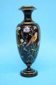 A Victorian black glass, decorated with enamels of