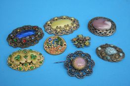 Eight various costume jewellery brooches