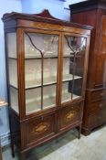 Glazed mahogany china cabinet