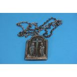 A 19th century silver religious locket, the revers