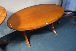 Reproduction mahogany oval coffee table