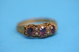 A Victorian 15ct gold amethyst and seed pearl ring