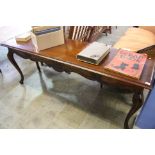 A long oak reproduction console table