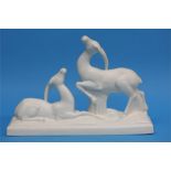 A 1930's Art Deco pottery group of two antelopes b