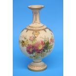A Royal Worcester vase decorated with holly leaves