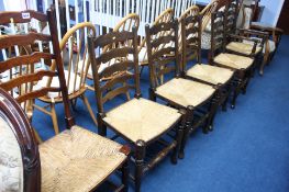 Set of six oak ladder back chairs