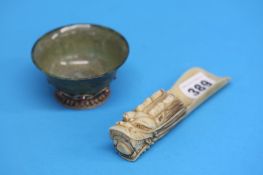 A small Jade coloured decorative bowl with silver