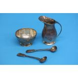 A small silver cream jug, silver sugar bowl and tw