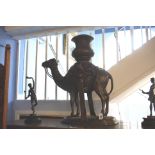 A large bronze urn in the form of a camel