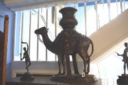 A large bronze urn in the form of a camel