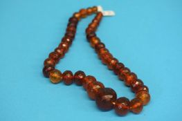 A faceted amber coloured necklace