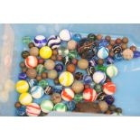 A collection of old coloured marbles