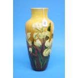 A Bretby Art Pottery tapering vase decorated with