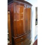 Bowfront mahogany linen press