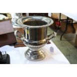 A silver plated wine cooler