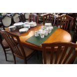 A teak Nathan 8 piece dining room suite, sideboard