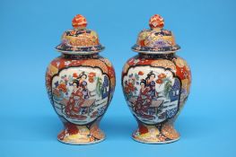 A pair of modern Oriental ginger jars and covers,