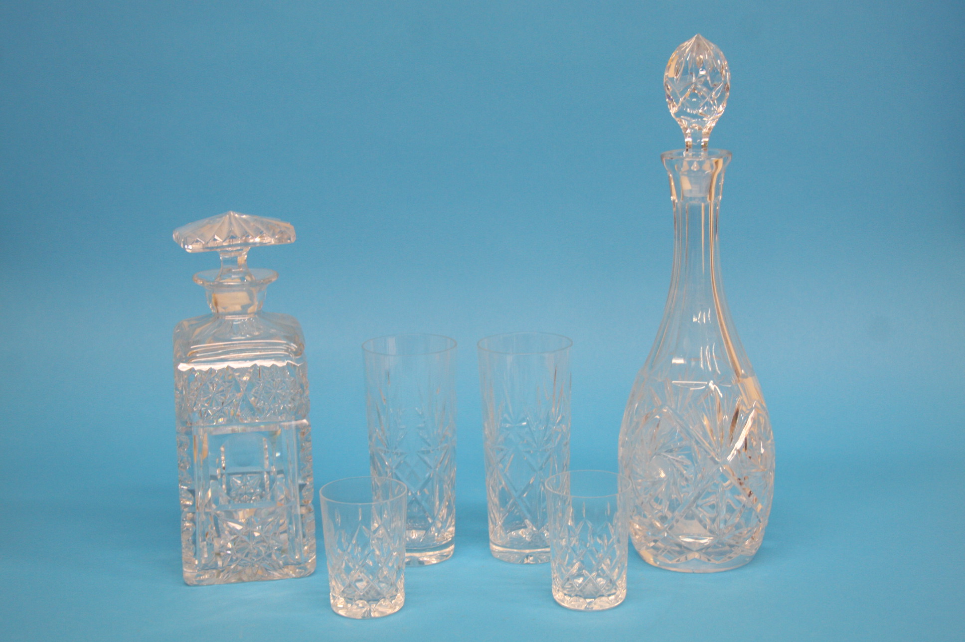 Two glass decanters and a suite of eighteen glasse