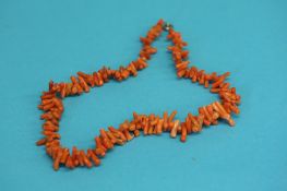 A Branch orange coral necklace