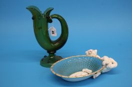 A Continental green glass horn shaped jug, 26cm he
