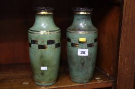 Pair of Wumak decorated vases