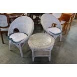 Pair cane chairs and a coffee table