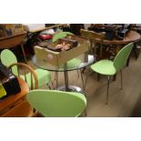 Glass top bistro table and four chairs
