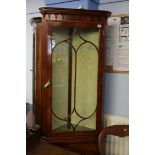 A Chapmans of Newcastle reproduction mahogany corner cabinet