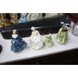 Four Royal Doulton figures