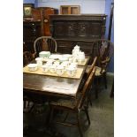 Oak 8 piece dining room suite, court cupboard, refectory table and 6 chairs