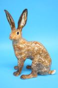 A Brown Winstanley seated hare. 38cm height