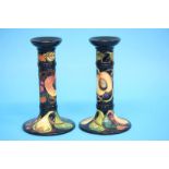 A pair of modern Moorcroft 'Queens choice' candles