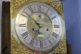 Oak 8 day long case clock, the brass face signed T