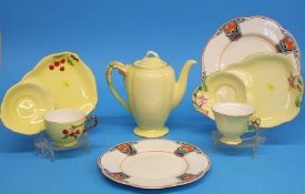 A Royal Winton 'Petunia' teapot, two cups and sauc