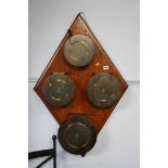 A wall hanging dinner gong