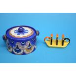 A Carlton Ware biscuit barrel on a blue ground dec