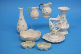 Nine pieces of Belleek china, two small cream jugs