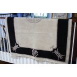 Black and cream Oriental design rug