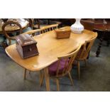 An Ercol Golden Dawn refectory table and four spin