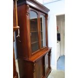 A reproduction Victorian design bookcase 113cm wide, 216cm height