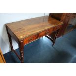 A Victorian mahogany 3 drawer side table with rose