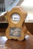Small leather cased mantle clock
