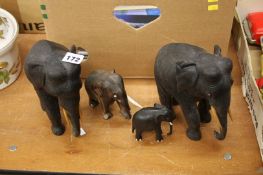 4 carved hardwood elephants