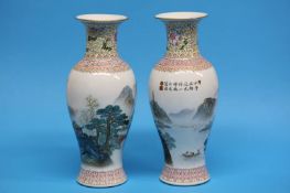 A pair of Chinese vases with flared rims, decorate