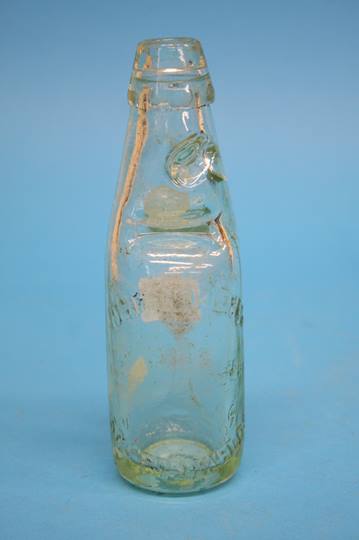 A clear glass bottle, James Grieves of South Shiel